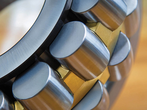 At what operating condition should the oil in SKF bearings be changed?